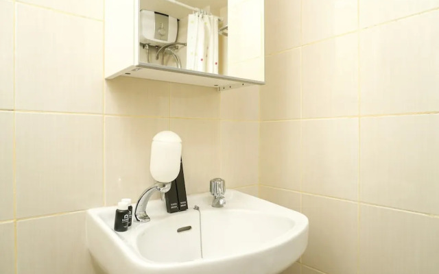 Simply White and Compact Studio at Amethyst Apartment