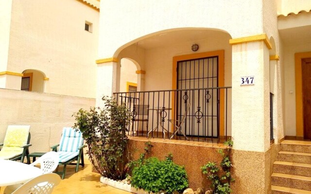 House with 3 Bedrooms in El Gran Alacant, with Wonderful Sea View, Pool Access, Enclosed Garden