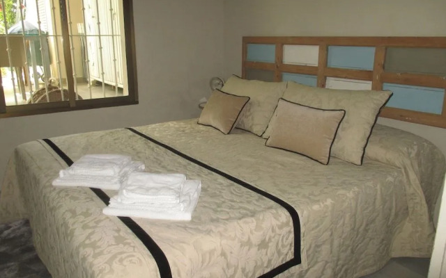Apartamento Bizcocheros con piscina y jardin