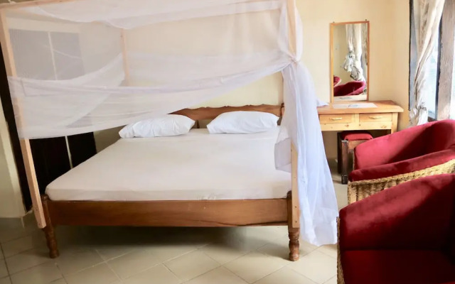 "room in Guest Room - A Wonderful Beach Property in Diani Beach Kenya.a Dream Holiday Place."