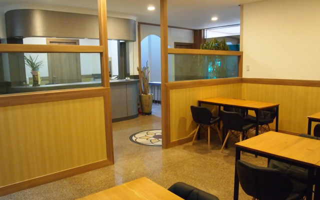 Traum Hotel & Condo