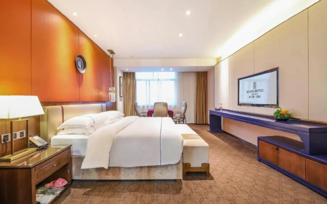 Rezen Heyi Hotel Yizhang