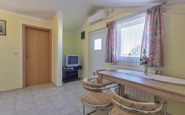 Nice Home in Peroj With Wifi and 2 Bedrooms