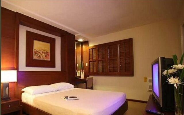 Amorsolo Mansion Apartments & Suites