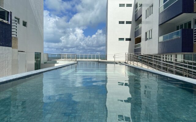 Bela Hospedagem - Vista piscina e mar