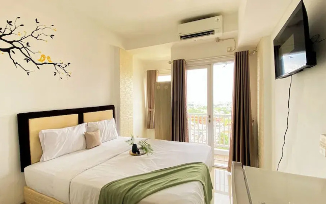 Homey And Cozy Living Studio At Poris 88 Apartment