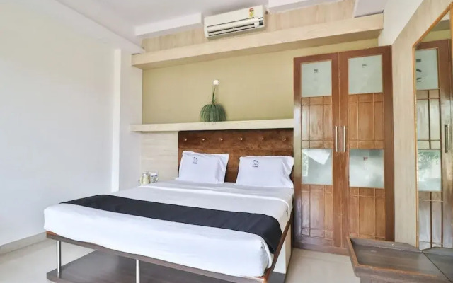 Holiday Palms by OYO Rooms