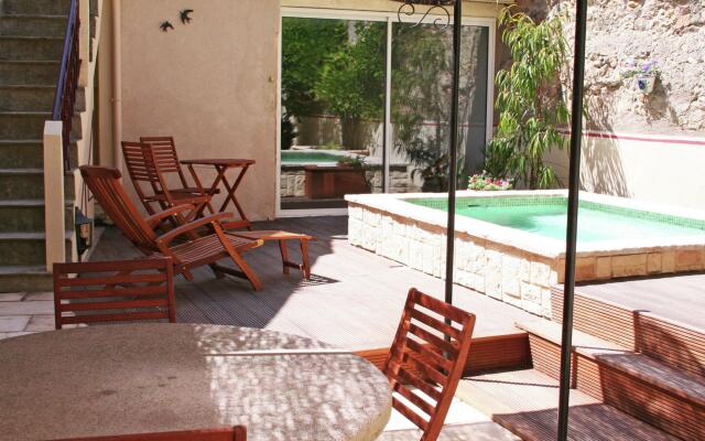 Alluring holiday home in Cazouls D'hérault with pool