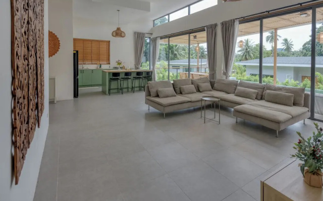 Tropical Poolside Retreat by Sea N' Rent