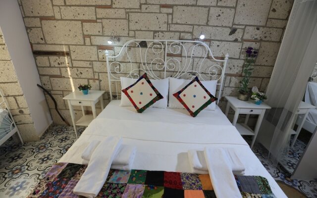 Muhit Alacati Butik Otel