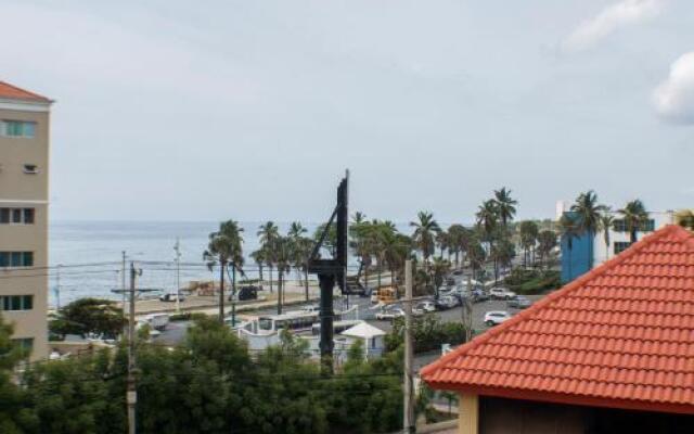 Malecon Rooms y Hotel