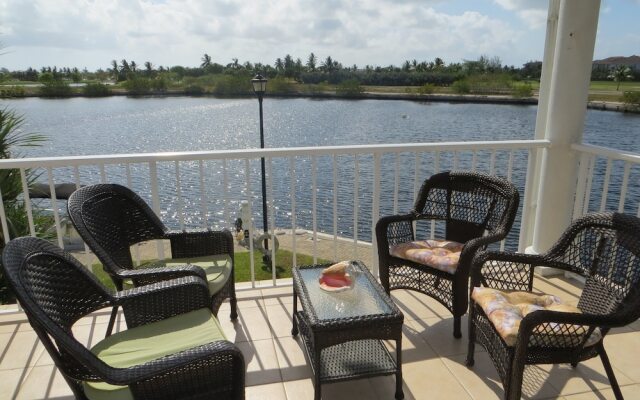 Sunrise Waterways by Cayman Vacation