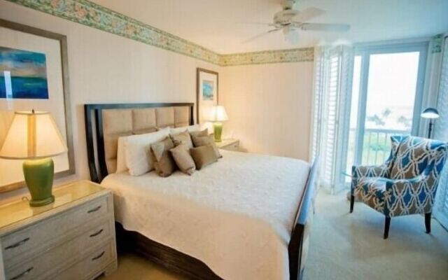 Cozy Condo with Gorgeous View of the Beach and Gulf by RedAwning