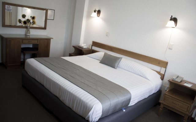 Estanza Hotel & Suites