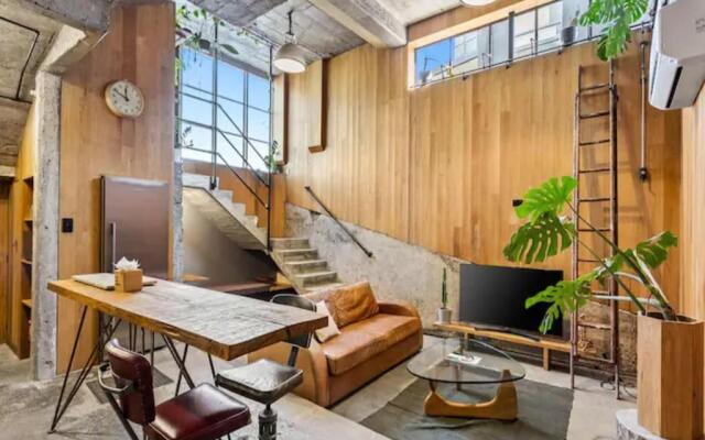 Unique Industrial-Style Apartment in Auckland