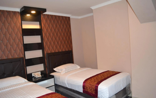 Puncak Budget Hotel – Guest Rooms – Pangkalpinang