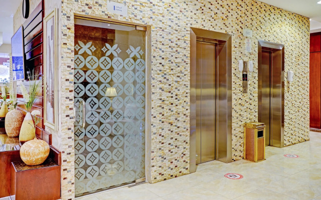 Capital O 596 Garden Palace Hotel