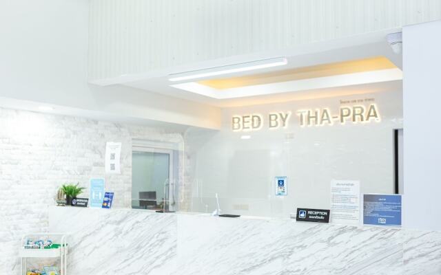 Bed by Tha-Pra Hotel and Apartment