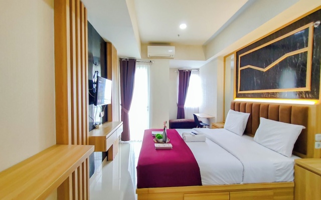 Wood Accents Studio At Grand Dharmahusada Lagoon Apartment