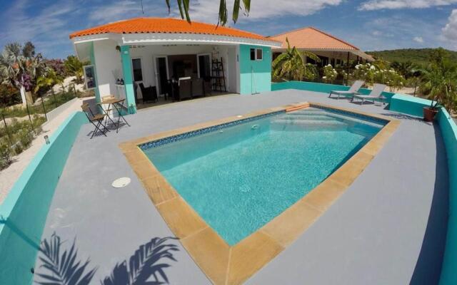 Luxury Villa, gated resort, 24/7 security, private pool, sea view.