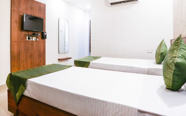 Treebo Comforts Inn, University Road Deralakatte