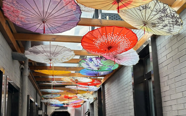 Qiuguo Hutong Courtyard Hotel