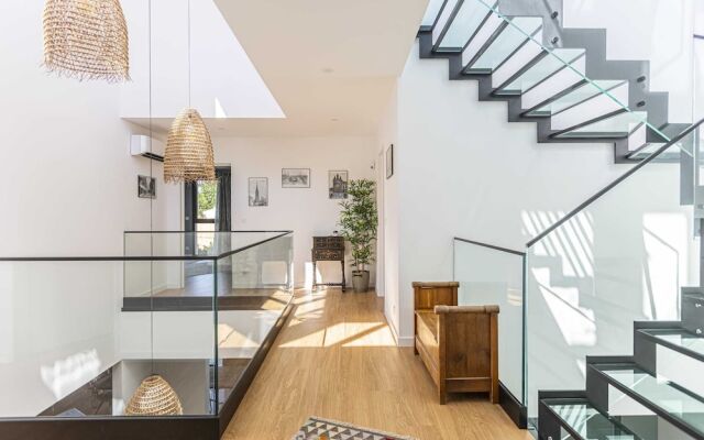 Stunning Home with Private Pool and Patio by GuestReady