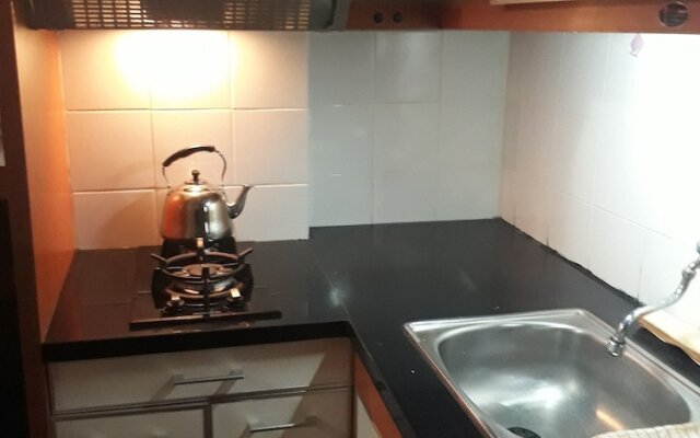 Apartment The Suites Metro by Herlan