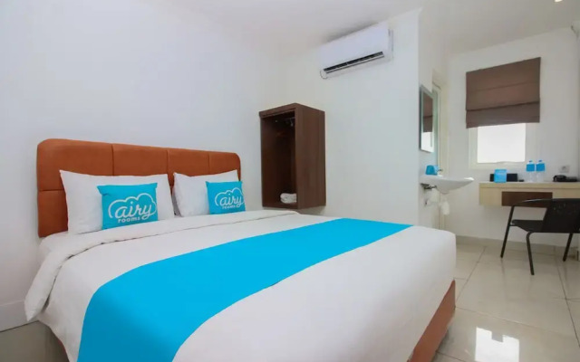 Airy Mapanget AA Maramis Manado