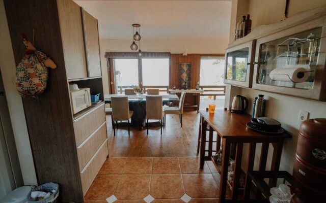 Casa com piscina e incrível vista