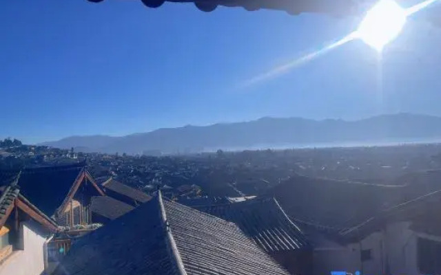 Lijiang Zhenmei Shishan Scenic Inn (Sifang Street Big Water Wheel Store)