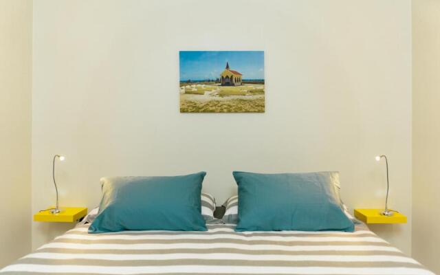 Hideout Suites - steps from Eagle Beach