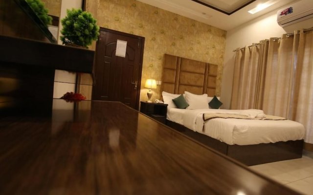 Cuzzy Inn Hotel Lahore