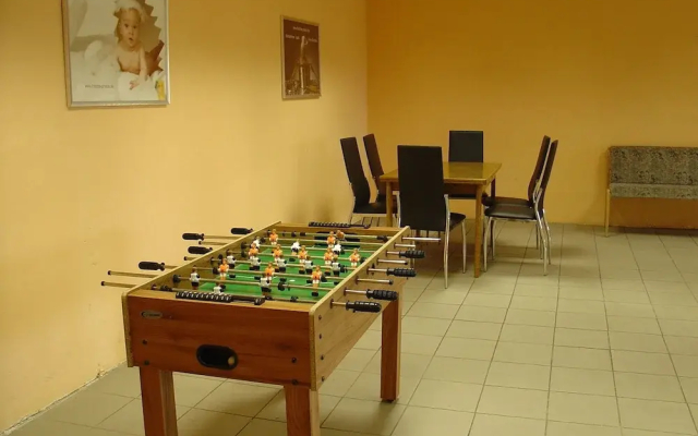 Detached, wooden bungalow with a terrace, in a wooded area