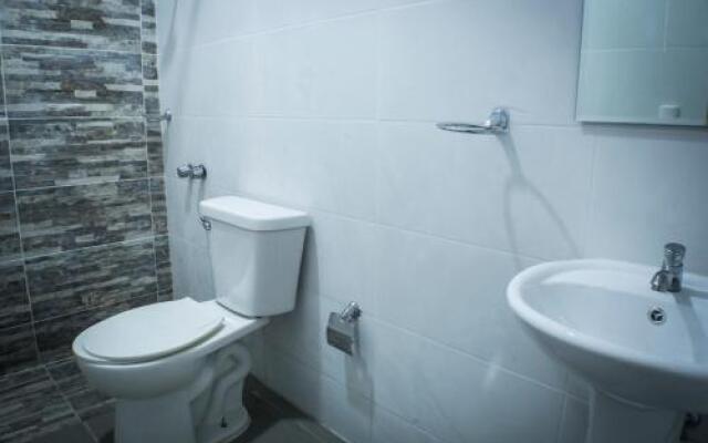 Malecon Rooms y Hotel