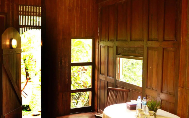 The Riverside Javanese Cottages