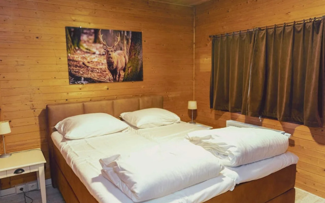 Cosy Chalet in Odeigne with Hot Tub