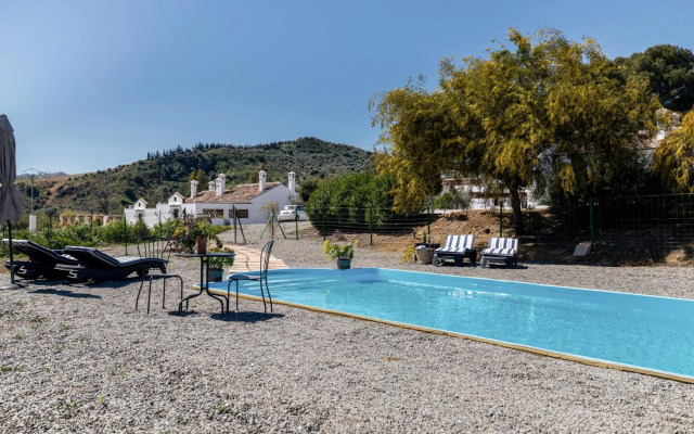 Casa Grande / Rosas Cantares