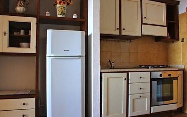 Cosy Holiday Home in Isola Rossa With Garden