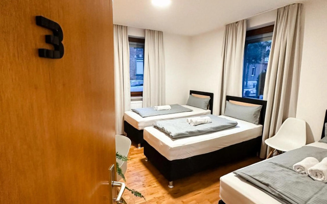 Suiteable Living - Boardinghaus mit Parkplätzen, WLAN und Waschraum