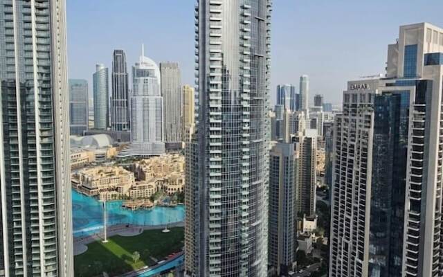 Primestay - 2BR Fountain View - Downtown