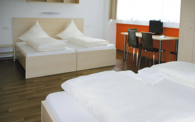 Orange Hotel und Apartments