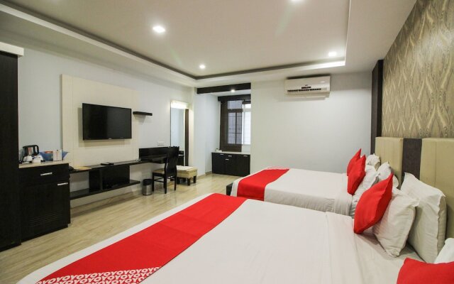 Capital O 15964 NI Ambaari Suites