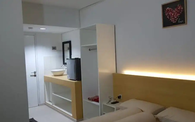 Grand Sentraland Karawang by Gkit Room