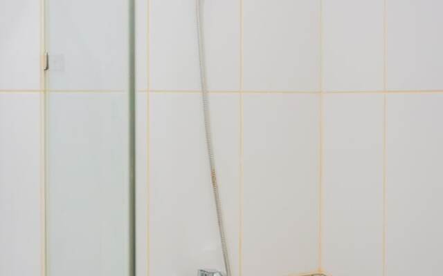 Cozy Studio Apartment at Tamansari Skylounge near Soetta Airport