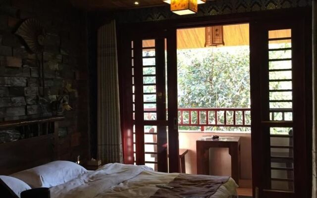 Xishuangbanna Fengweizhu Inn
