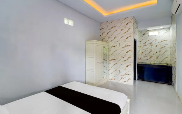Hotel O near Mangusada Hospital formerly Rare Home Cozy Stay Premier 2 – Guest Rooms – Lukluk