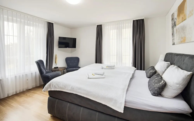 VISIMO Apartments Felsenstrasse St Gallen - Elegant heritage building in a quiet neighbourhood – Guest Rooms – St. Gallen