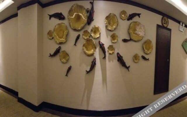 Xin Tian Le Hotel