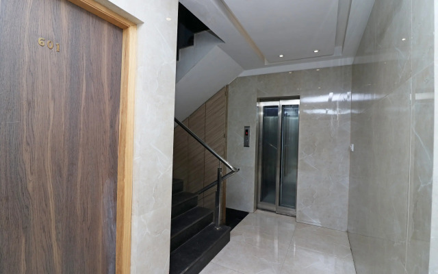 Capital O 7743 Hotel Hiland International